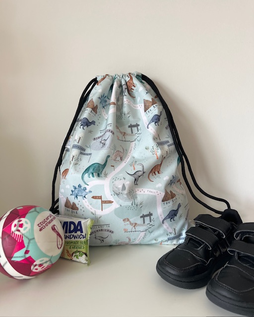 Turnbeutel / Tasche in hellblau mit Dino-Motiv für Kinder